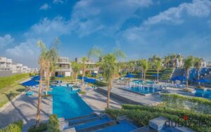 للبيع فيلا توين هاوس 220 متر كمبوند باتيو الزهراء , الشيخ زايد ( فيو مميز على النادي الاهلي ) 18,200,000 ج.م