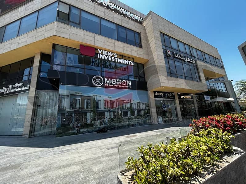 محل تجارى ارضي للايجار في ازار مول - بالم هيلز - مساحه 175 متر نص تشطيب - واجهه 0