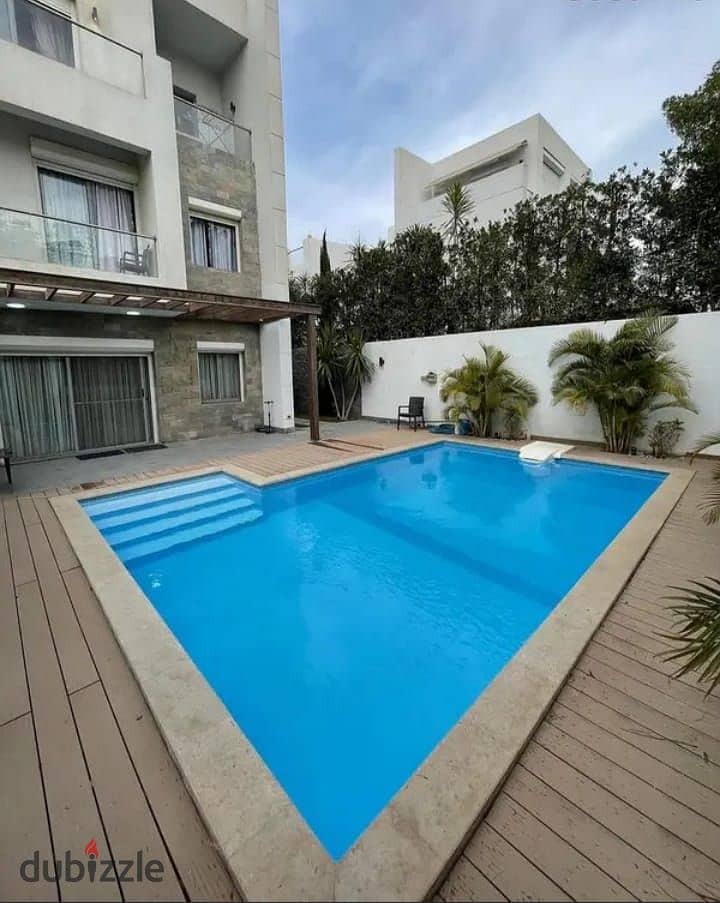 فيلا بـ حمام سباحه خاص بتطل على لاندسكيب - موقع مميز بجوار بالم هيلز و جدار 0