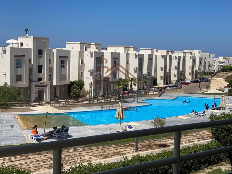 شاليه للبيع 146م في أمواج الساحل الشمالي بدور أول وتراس بحري وإطلالة مباشرة على حمام السباحة وموقع مميز قريب من الأكوا وخدمات القرية المتكاملة. 0