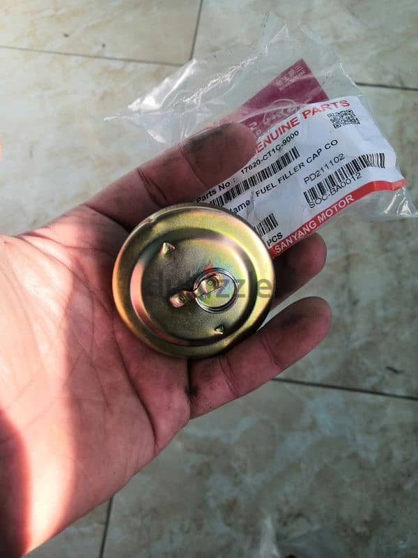 غطاء تانك بنزين sym جديد من التوكيل 0