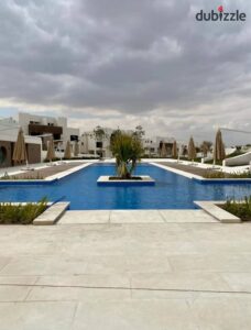 بسعر مميز فيلا مستقله للبيع علي حمام سباحة مباني 420م ارض 460م فيو مميز 5 غرف ماستر فى كمبوند سولايا بالقرب من نيو جيزة و بالقرب من جولز و الشيخ زايد 21,000,000 ج.م