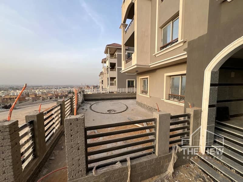 علي اعلي هضبة بفيو مميز علي الشيخ زايد شقة ارضي بجاردن بحصة في الارض كمبوند الخمايل Khamael Compound الشيخ زايد 0