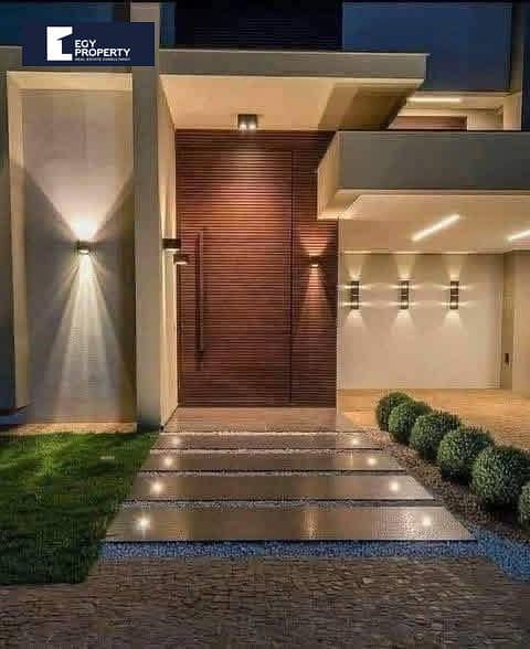 فيلا فاخرة بموقع خيالي و سعر مميز للبيع في كمبوند Jiwar التجمع - القاهرة الجديدة 0