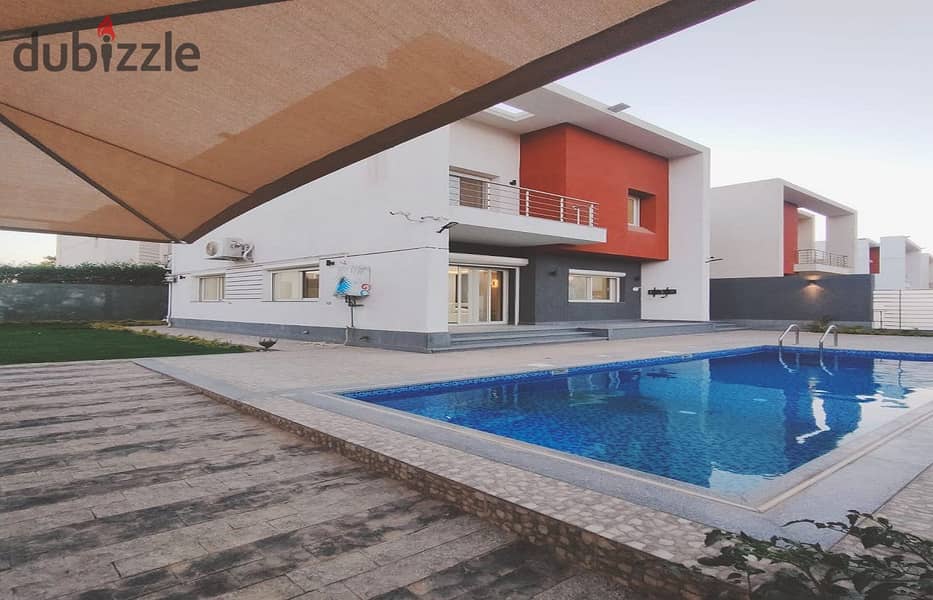 فيلا للبيع بمدينتي نموذج i مودرن تشطيب خاص بالفرش والاجهزة وبحمام سباحة مباني231م وارض 295م 0