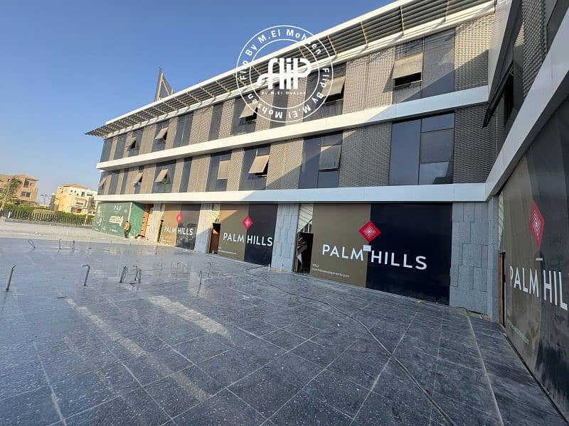محل تجاري للبيع بموقع مميز في جولف سنترال – بالم هيلز 0