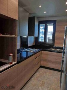 شقه للايجار بكمبوند باديه بالم هيلز بجوار جامعه MSA و المتحف المصري بالمطبخ والاجهزه و التكيفات و ال درسينج و السخانات 147م 25,000 ج.م