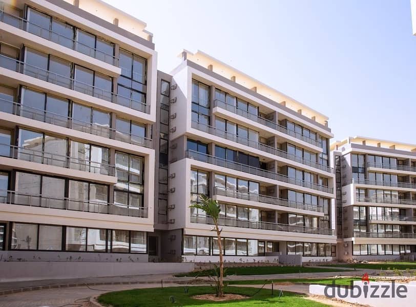 لقطة من معمار المرشدي شقة في ليك فرونت أكتوبر بجوار مدينة زويل بمقدم 350 ألف بس 0