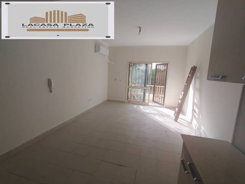 شقة ارضى بجاردن بها مطبخ بعمارات المستقبل دهانات جديدة مؤمنة حديد بجوار ذا ادرس كمبوند 0