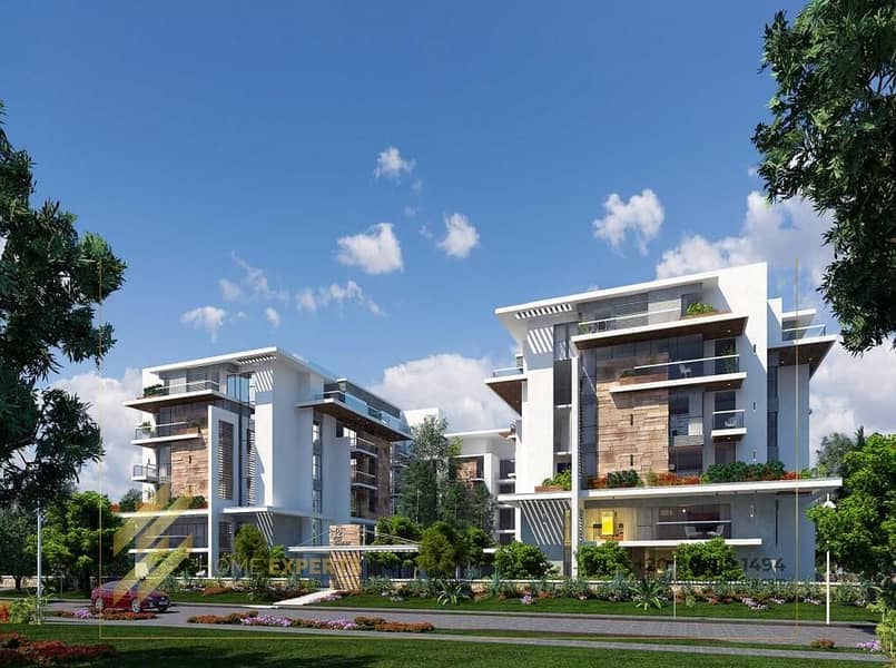 شقة مع حديقة للبيع في كمبوند ماونتن فيو اي سيتي 0