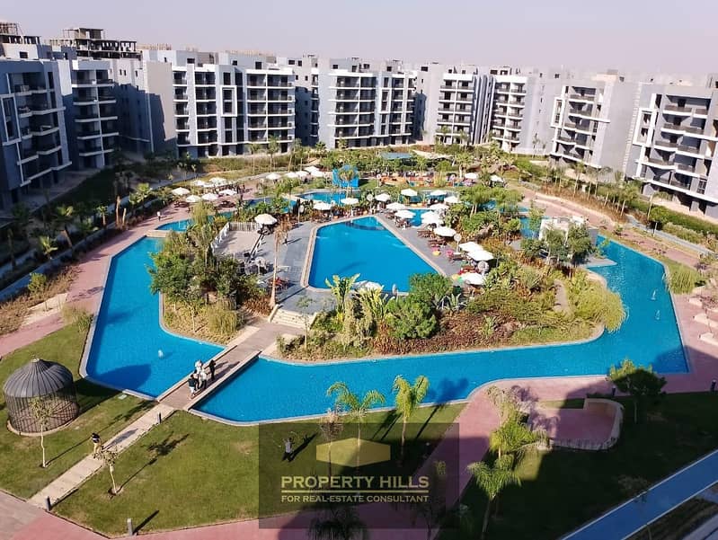 امتلك شقتك فورا بفيو لاجون فى صن كابيتال بالقرب من دريم لاند و بيراميدز هيلز 0