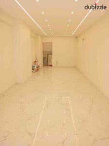 محل للايجار 50 م / سابا باشا على الترام واجهة 4 متر كامل المرافق اول استخدام مبانى حديثة 32,000 ج.م