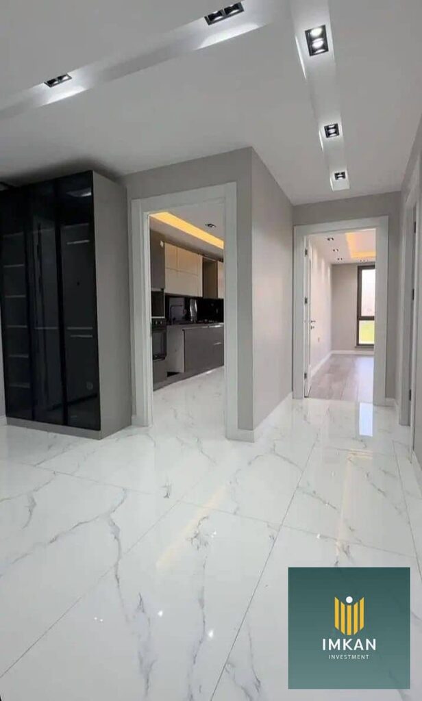 شقة متشطبة 121م استلام فورى بالتقسيط فى كمبوند المقصد امام البرج الايقونى - العاصمة الادارية - القاهرة 0