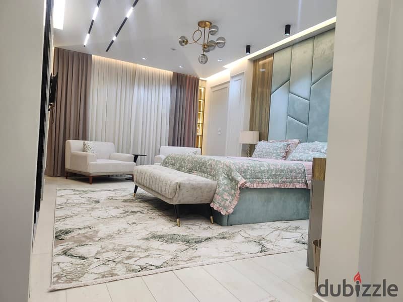 شقة فاخرة للبيع بالتوسعات الشمالية – مفروشة بالكامل وجاهزة للسكن 0