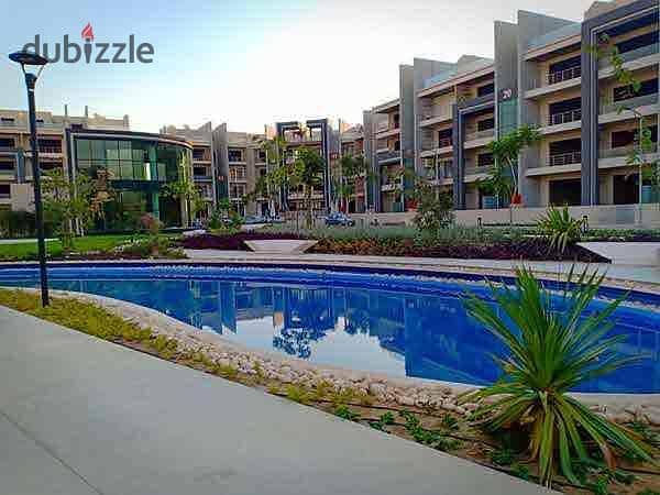 شقة فيو جاردن بالدور الثاني نص تشطيب بكمبوند ميد تاون امام الجامعة الامريكية التجمع الخامس 0