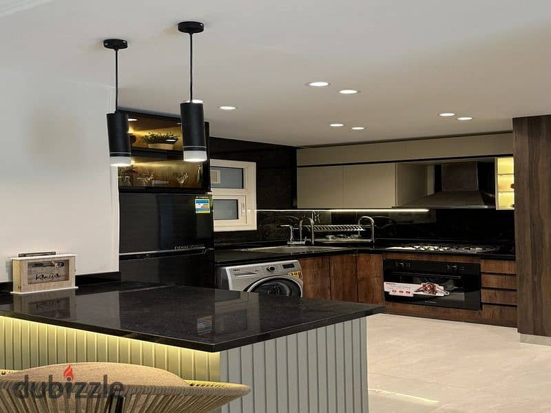 اشيك شقة مفروشة للإيجار بمدينتي B12 فيو جاردن تشطيبات وفرش سوبر 0