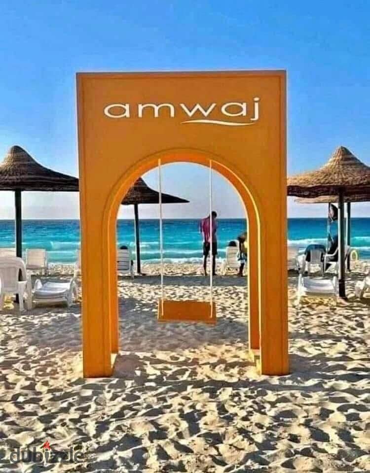 شالية لوفت 78م للبيع في قرية امواج الساحل الشمالي فيو مميز جدا على حمام سباحة وشايف البحر 0