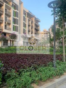 شقة 3 غرف مع حديقة خاصة للبيع بكمبوند ذا ايكون بجوار ال AUC تسهيلات ع 10سنين 4,823,000 ج.م