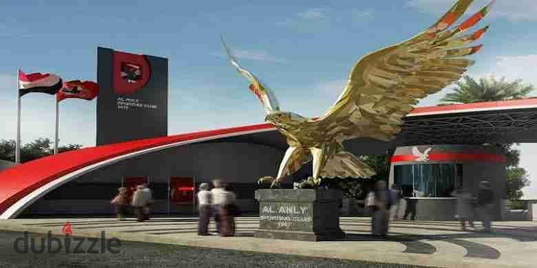 ارض تجاري امام النادي الاهلي الشيخ زايد للبيع 0