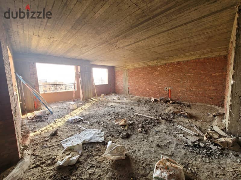 شقة للبيع نص تشطيب فى الحى السادس عشر بارقى احياء الشيخ زايد 0