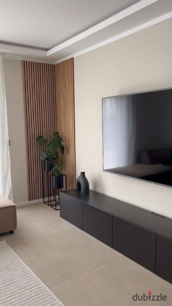 شقة كاملة التشطيب بداخل  بالم هيلز امام اركان بلازا مباشرة بأطول فترة سداد تصل ل 10 سنوات 0