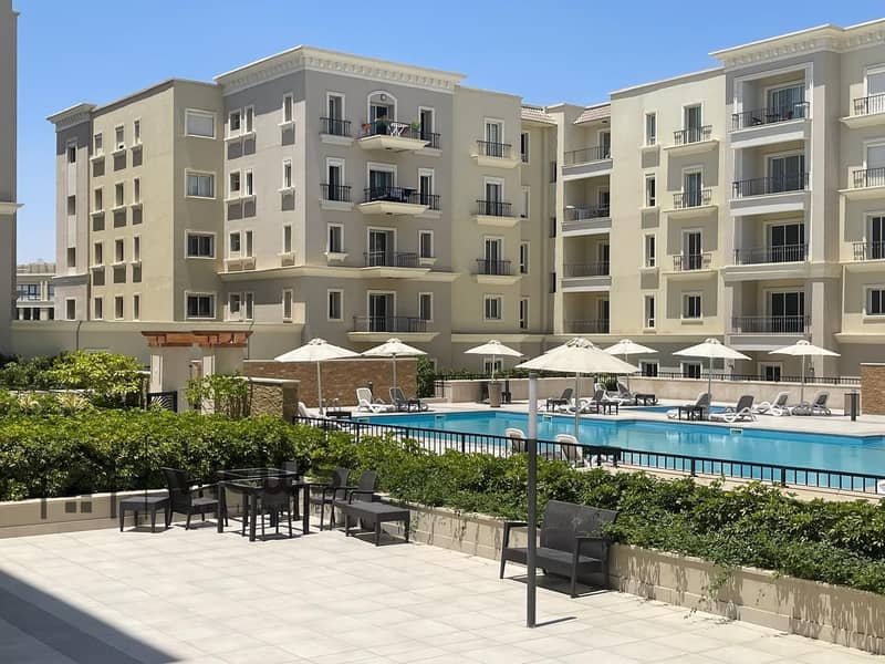 شقة للبيع 191م مباشر علي حمام السباحة متشطبة بالمطبخ و التكيفات بكمبوند ميفيدا Mivida 0