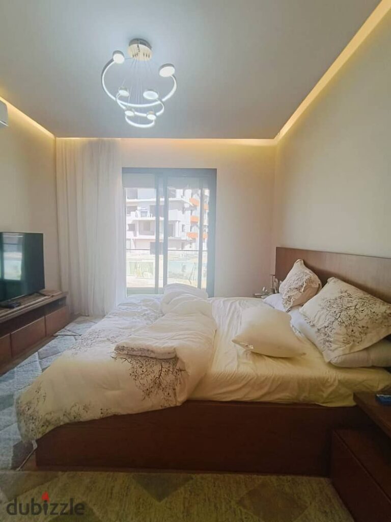 اول سكن شقه 2 غرف  مفروشه بالكامل  جاهزة لسكن موقع مميز فيو حمام سباحه و لاندسكيب مع غرفه مربيه villette sodic 0