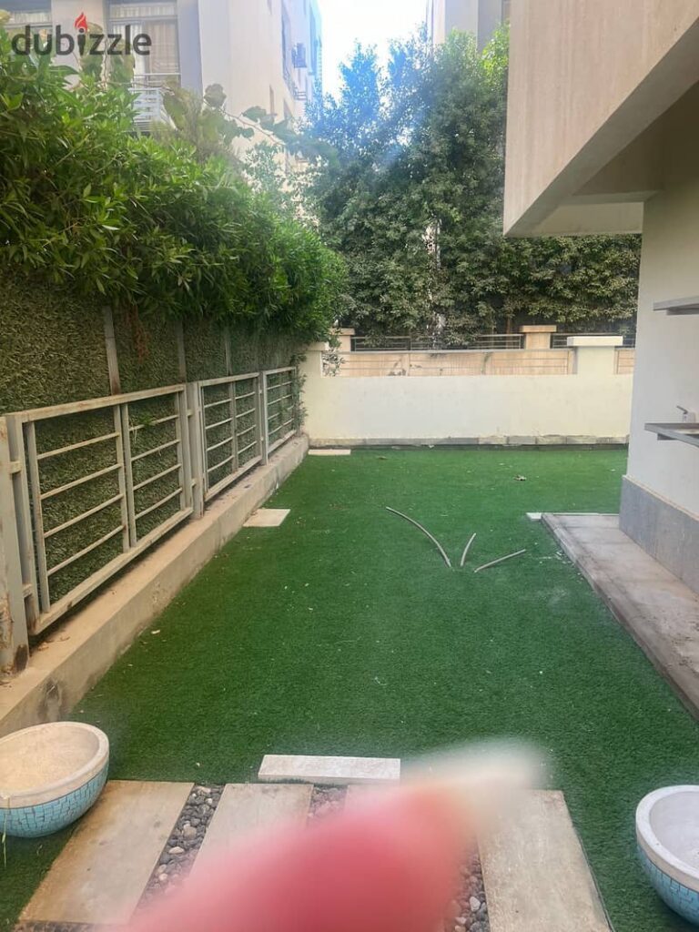 شقة ارضي بحديقة  بالمطبخ و اجهزته و التكيفات 170م بكمبوند تاج سلطان - تاج سيتي التجمع 0