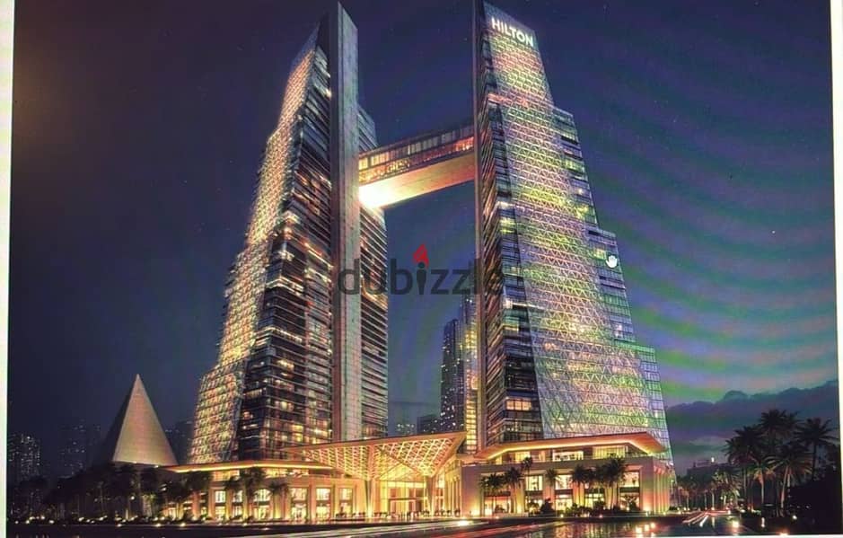 شقة فندقية60  متر  للبيع فى هيلتون طريق الفيوم مباشرة متشطبة بالكامل بالفرش و التكييفات و على  فيو الاهرامات بالتقسيط 10% على 10 سنوات 0