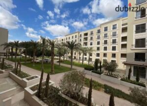 10,200,000 ج.م شقة أرضي بحديقة للبيع داخل كمبوند Village West درة – 154م تشطيب Ultra Super Lux بالتكييفات مع باكية جراج وخطة سداد مميزة