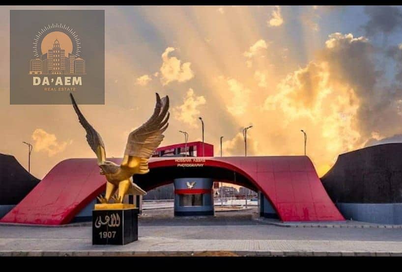 ارض للبيع في الحي الرابع خطوات من النادي الاهلي واجهه بحري  بيت الوطن التجمع الخامس القاهرة الجديدة 0