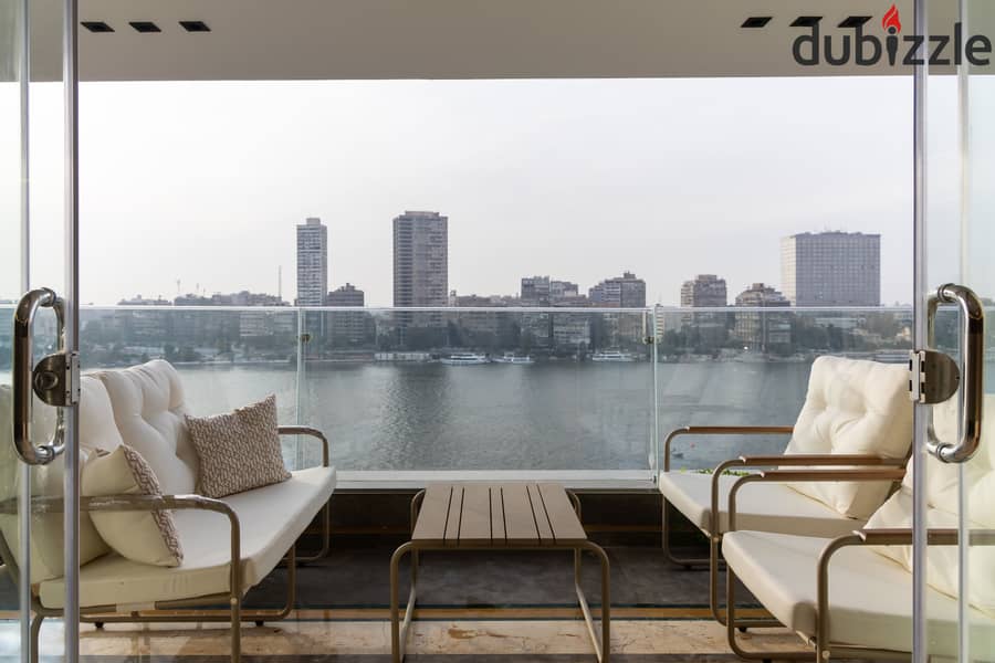 شقة 4 غرف مفروشة  للإيجار اليومي للعائلات بإطلالة بانورامية على النيل | المنيل 0
